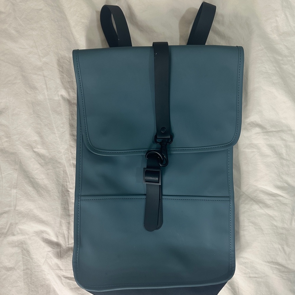 Rains Blue and Black Backpack Minimalist Design